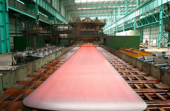 Plate exiting the finishing area of a Plate Mill