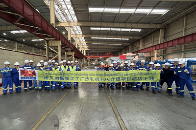 Representatives from Novelis Aluminum and Primetals Technologies celebrating the successful upgrade project at Novelis Aluminum’s hot-rolling mill located in Zhenjiang.
