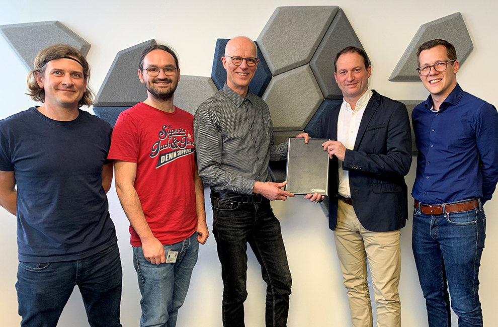 Tata Steel Nederland has tasked Primetals Technologies with the implementation of an advanced pellet pot grate testing facility. From left to right: Piotr Ksen, Project Manager, Hans-Jörg Baumgartner, Process Engineer, both with Primetals Technologies; Jan Baalbergen, Project Manager at Tata Steel IJmuiden; Christoph Aichinger, Head of Agglomeration, and Thomas Marton, Commercial VP Ironmaking, both with Primetals Technologies. 